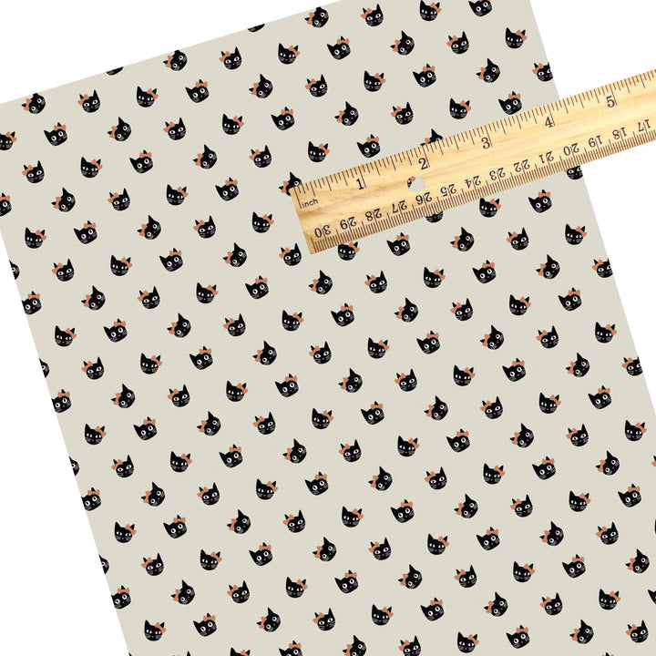 Bow Cats on Taupe Faux Leather Sheets