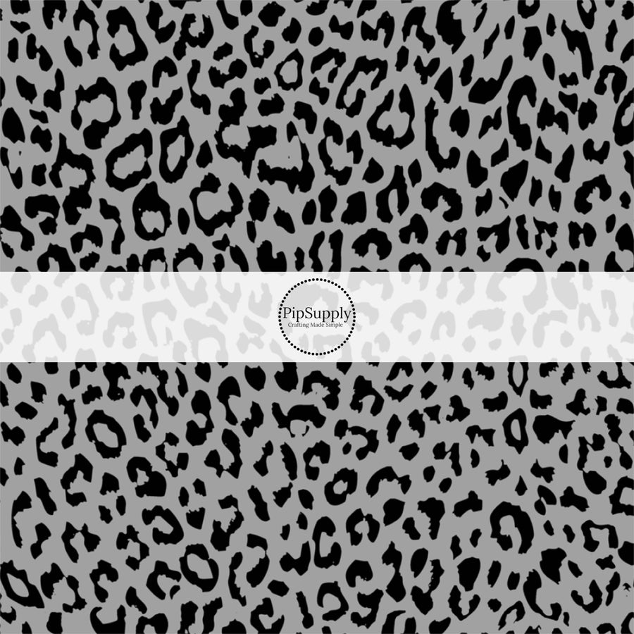 This classic leopard pattern themed fabric by the yard features charcoal colored leopard print. This fun Valentine's Day themed fabric can be used for all your sewing and crafting needs!