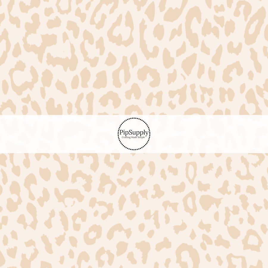 This classic leopard pattern themed fabric by the yard features cream colored leopard print. This fun Valentine's Day themed fabric can be used for all your sewing and crafting needs!