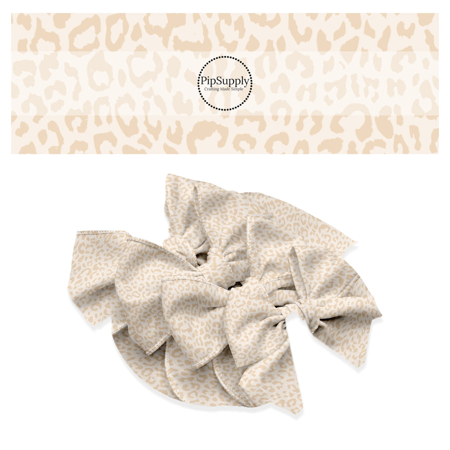 These classic leopard pattern themed no sew bow strips can be easily tied and attached to a clip for a finished hair bow. These Valentine's Day bow strips are great for personal use or to sell. These bow strips feature cream colored leopard print.