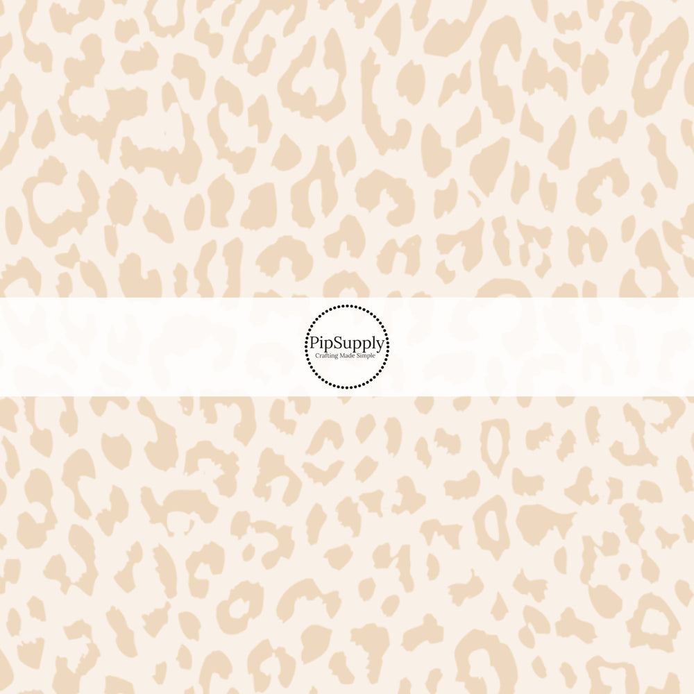 These classic leopard pattern themed no sew bow strips can be easily tied and attached to a clip for a finished hair bow. These Valentine's Day bow strips are great for personal use or to sell. These bow strips feature cream colored leopard print.