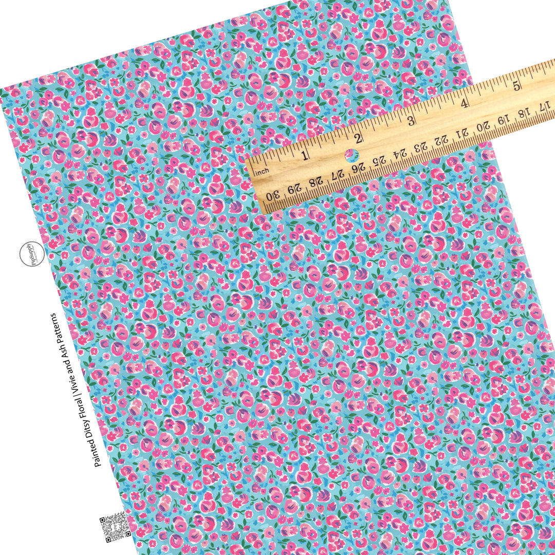 These spring floral faux leather sheets contain the following design elements: pink painted ditsy floral on blue. Our CPSIA compliant faux leather sheets or rolls can be used for all types of crafting projects.