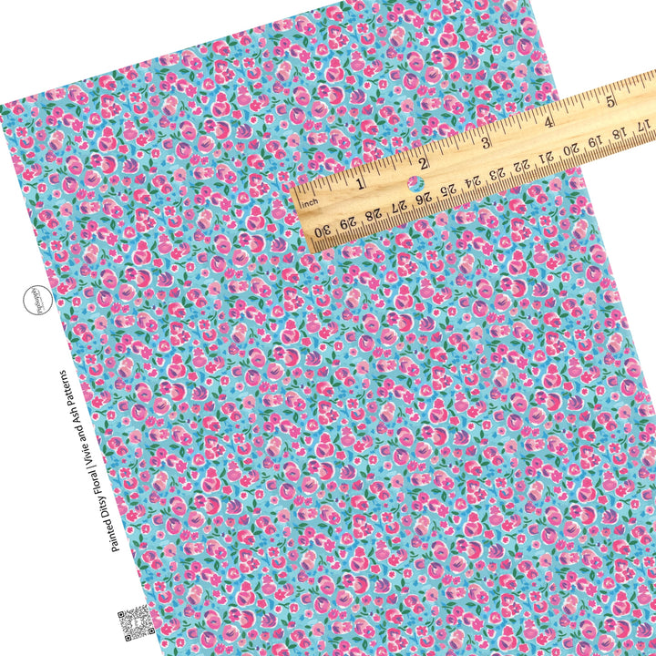 These spring floral faux leather sheets contain the following design elements: pink painted ditsy floral on blue. Our CPSIA compliant faux leather sheets or rolls can be used for all types of crafting projects.