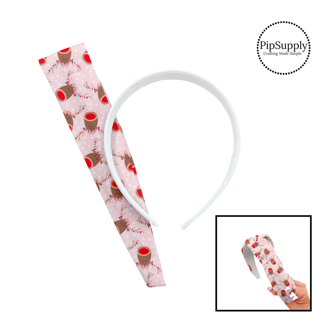 These holiday pattern themed headband kits are easy to assemble and come with everything you need to make your own knotted headband. These fun Christmas kits include a custom printed and sewn fabric strip and a coordinating velvet headband. The headband kits features reindeers with Christmas lights on light pink with small white dots.