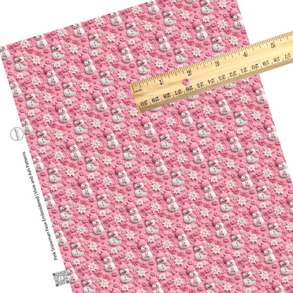 These holiday sewn pattern themed faux leather sheets contain the following design elements: pink and white snowflakes and snowman on pink. Our CPSIA compliant faux leather sheets or rolls can be used for all types of crafting projects.