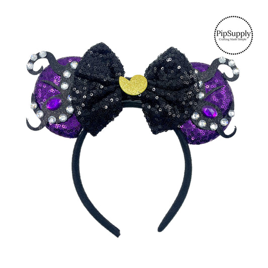 These black mouse ear headbands are a stylish hair accessory. These comfortable headbands have attached a black glitter bow and purple glitter mouse ears. Along with sea shell and rhinestone embellishments. This hair accessory comes completely assembled and is great for park vacations, costumes or for everyday wear!