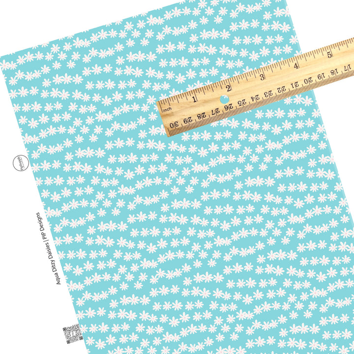 These spring daisies pattern themed faux leather sheets contain the following design elements: tiny white daisies on aqua. Our CPSIA compliant faux leather sheets or rolls can be used for all types of crafting projects. The designer of this pattern is Hay Sis Hay.