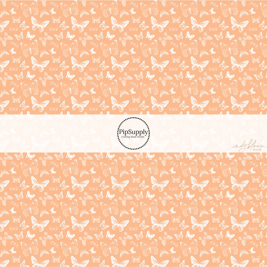 These spring fabric by the yard features boho butterflies on peach. This fun pattern fabric can be used for all your sewing and crafting needs!