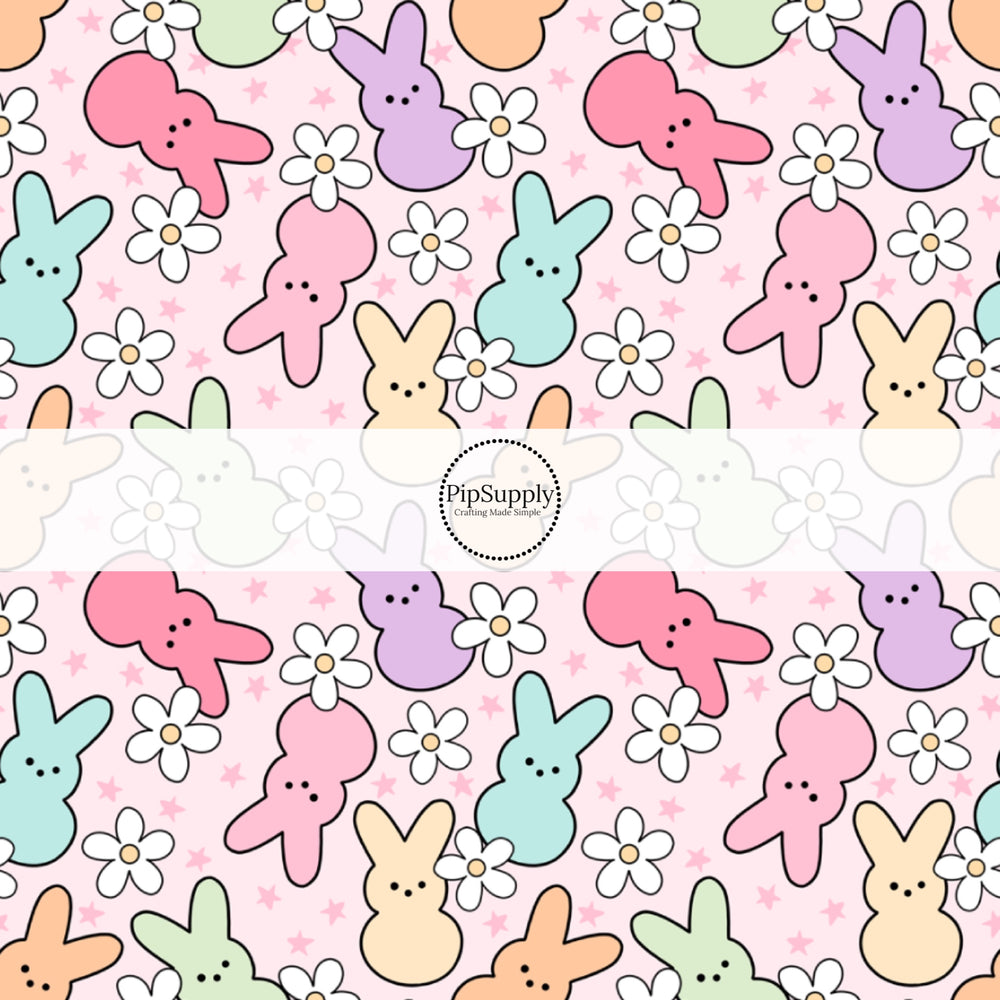 These spring patterned headband kits are easy to assemble and come with everything you need to make your own knotted headband. These kits include a custom printed and sewn fabric strip and a coordinating velvet headband. This cute pattern features bright colored bunnies surrounded by white daisies and tiny stars on light pink.