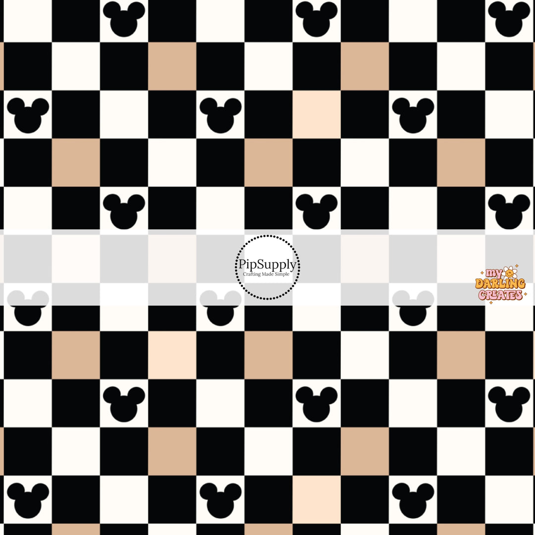 This magical inspired fabric by the yard features the following design: black, nude and cream checker pattern with mouse ears. This fun themed fabric can be used for all your sewing and crafting needs!