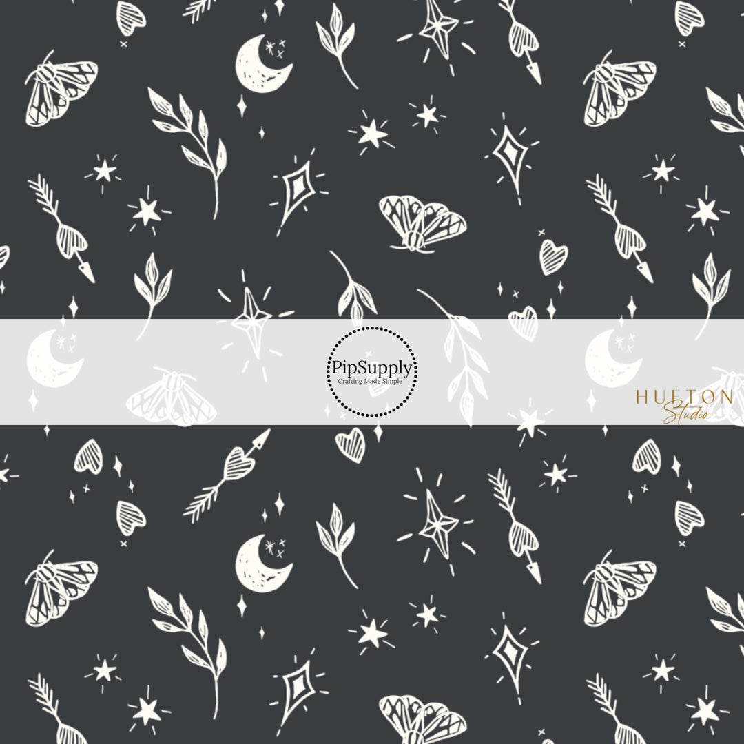 These Halloween themed black fabric by the yard features cream leaves, moths, hearts, moons, and stars on black. This fun themed fabric can be used for all your sewing and crafting needs!