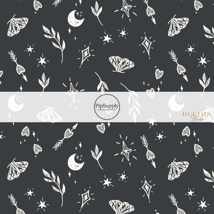 These Halloween themed black fabric by the yard features cream leaves, moths, hearts, moons, and stars on black. This fun themed fabric can be used for all your sewing and crafting needs!