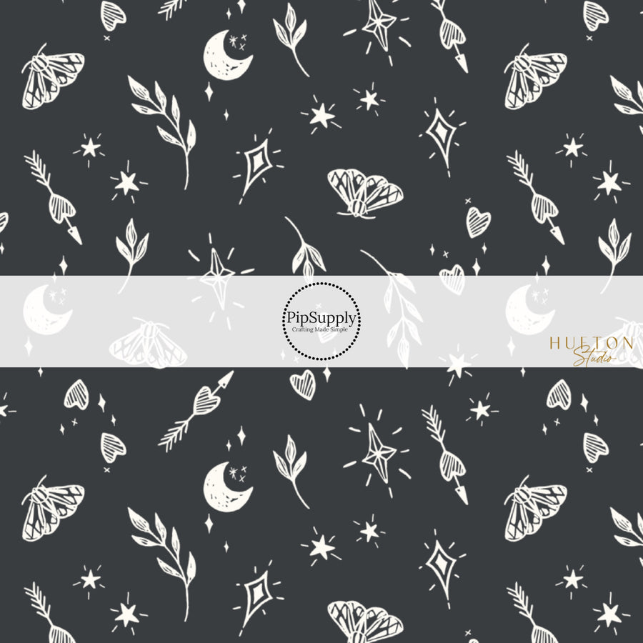 These Halloween themed black fabric by the yard features cream leaves, moths, hearts, moons, and stars on black. This fun themed fabric can be used for all your sewing and crafting needs!