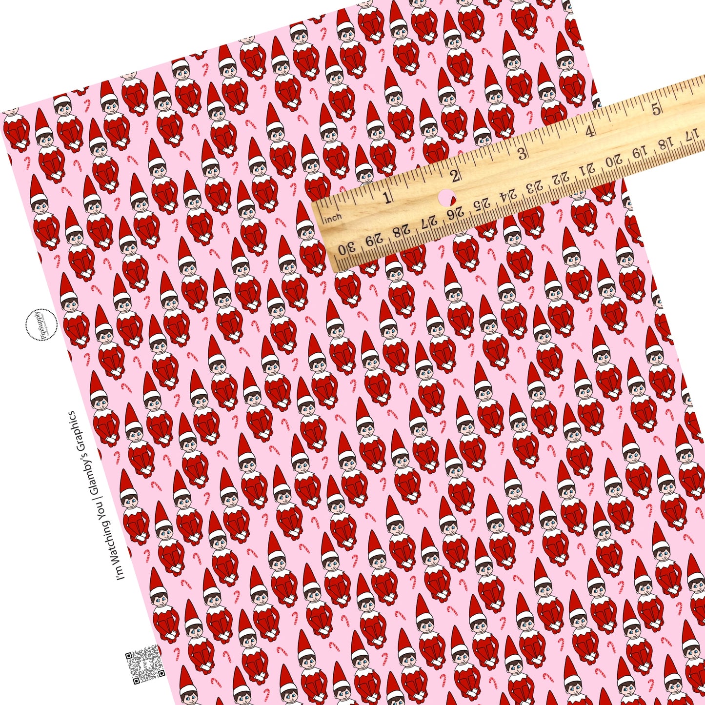 elves with red clothes and hats on pink faux leather sheets