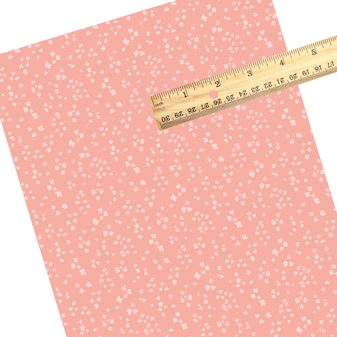 These spring themed faux leather sheets contain the following design elements: tiny floral pattern. Our CPSIA compliant faux leather sheets or rolls can be used for all types of crafting projects.