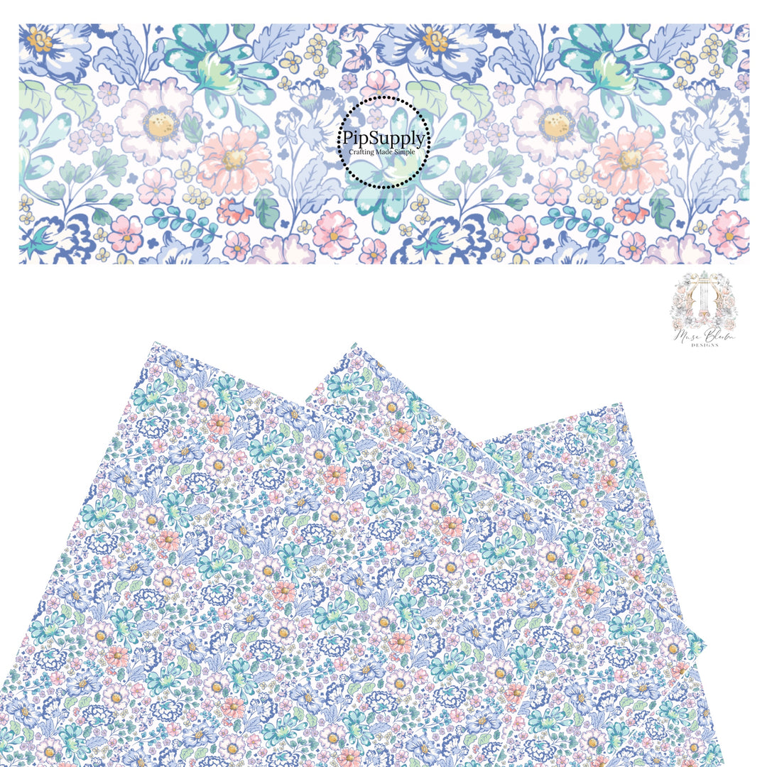 These floral themed cream faux leather sheets contain the following design elements: navy blue, light blue, teal, cream, light pink, yellow, and aqua flowers on cream.