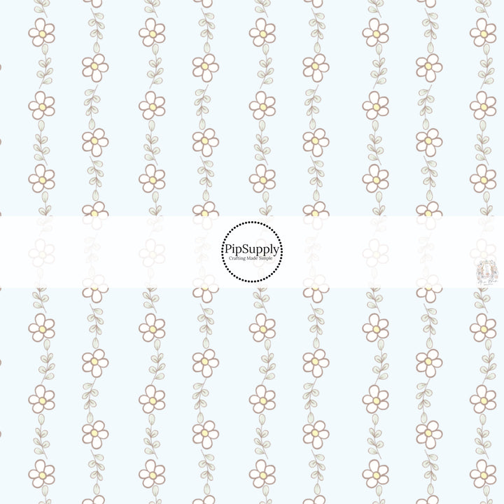 This spring floral fabric by the yard features tiny daisies on light blue. This seasonal pattern fabric can be used for all your sewing and crafting needs!