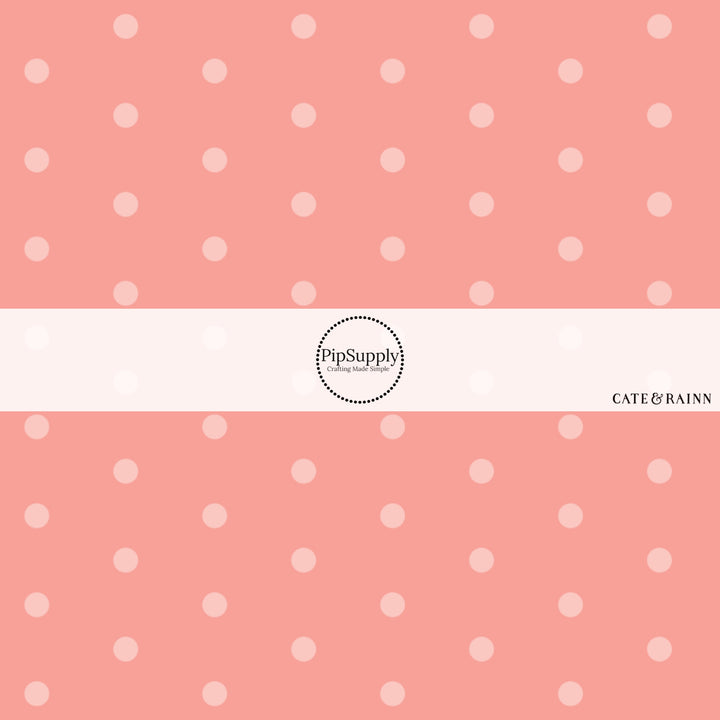 These dot fabric by the yard features peach dots pattern. This fun pattern fabric can be used for all your sewing and crafting needs!