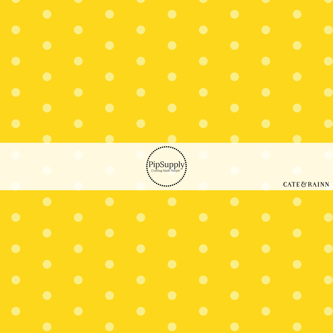 These dot fabric by the yard features yellow dots pattern. This fun pattern fabric can be used for all your sewing and crafting needs!