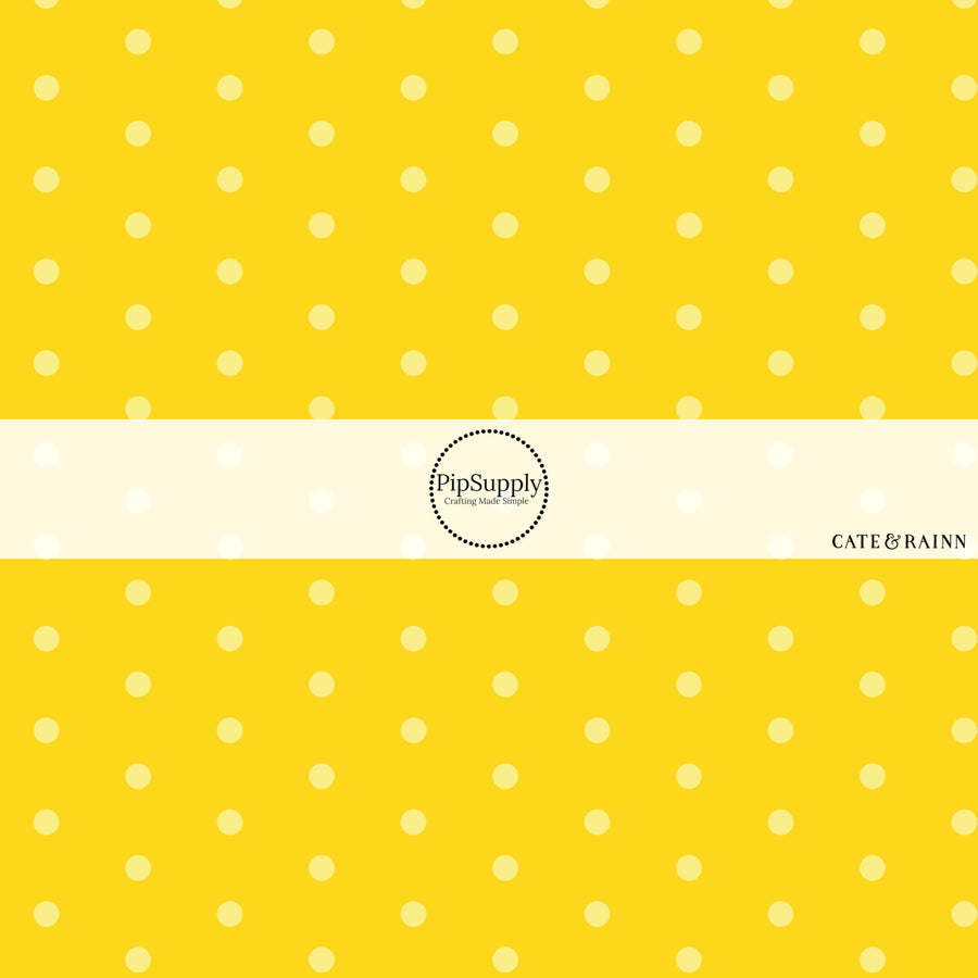 These dot fabric by the yard features yellow dots pattern. This fun pattern fabric can be used for all your sewing and crafting needs!