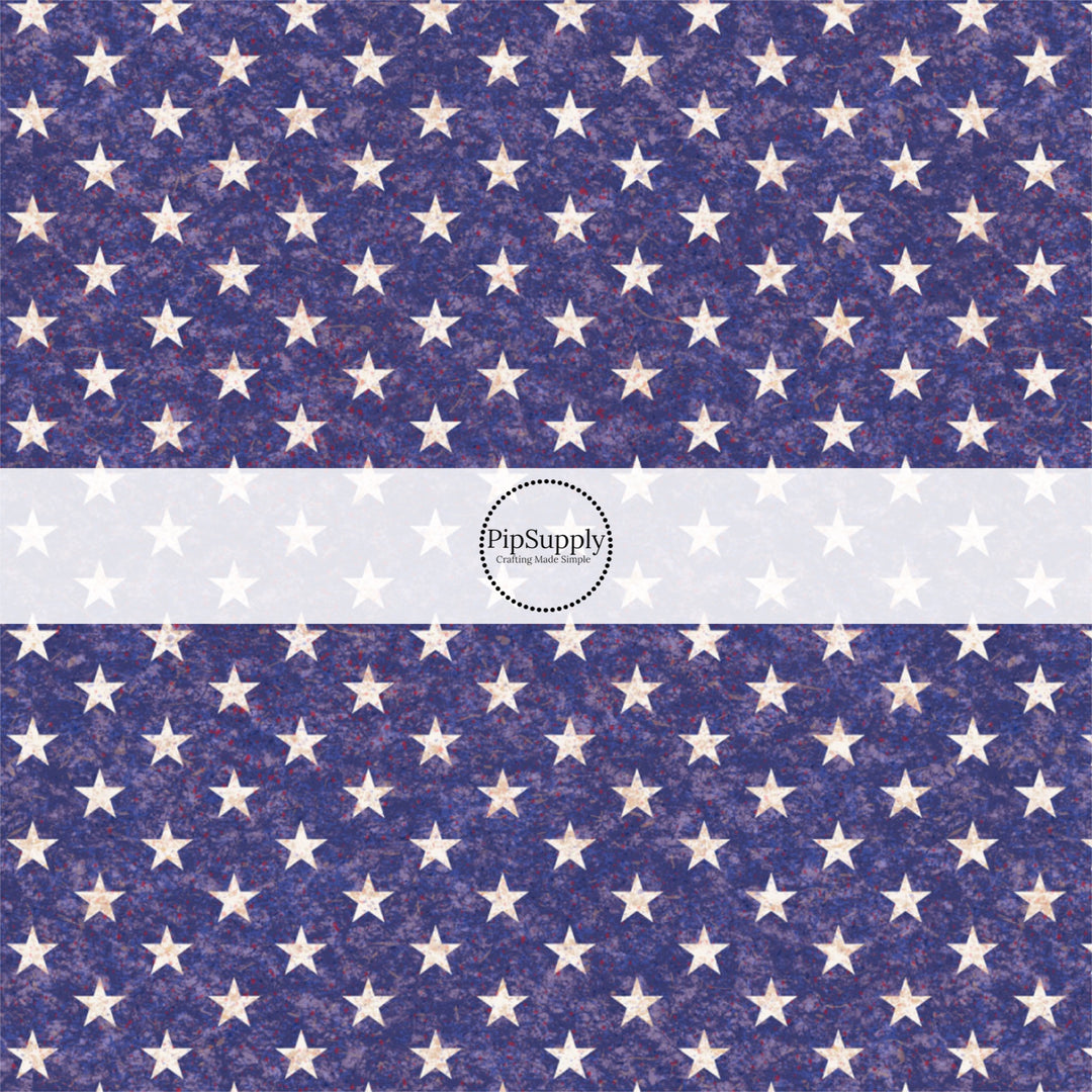 These patriotic fabric by the yard features white stars on blue. This fun pattern fabric can be used for all your sewing and crafting needs!