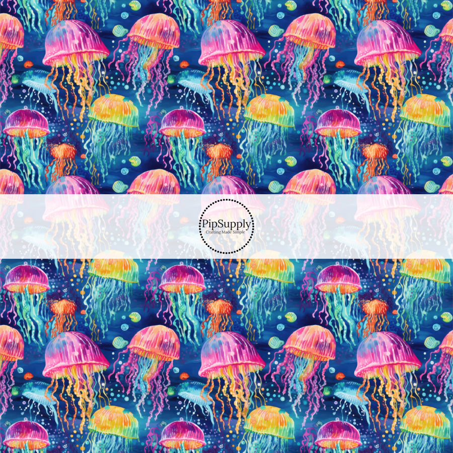 These tropical ocean themed fabric by the yard features glowing jelly fish. This fun pattern fabric can be used for all your sewing and crafting needs!