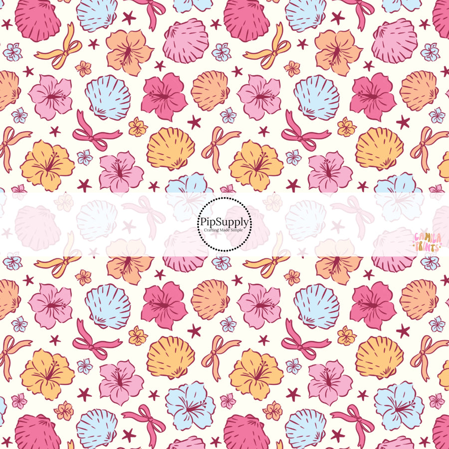 These tropical themed fabric by the yard features tropical flowers and shells. This fun pattern fabric can be used for all your sewing and crafting needs!
