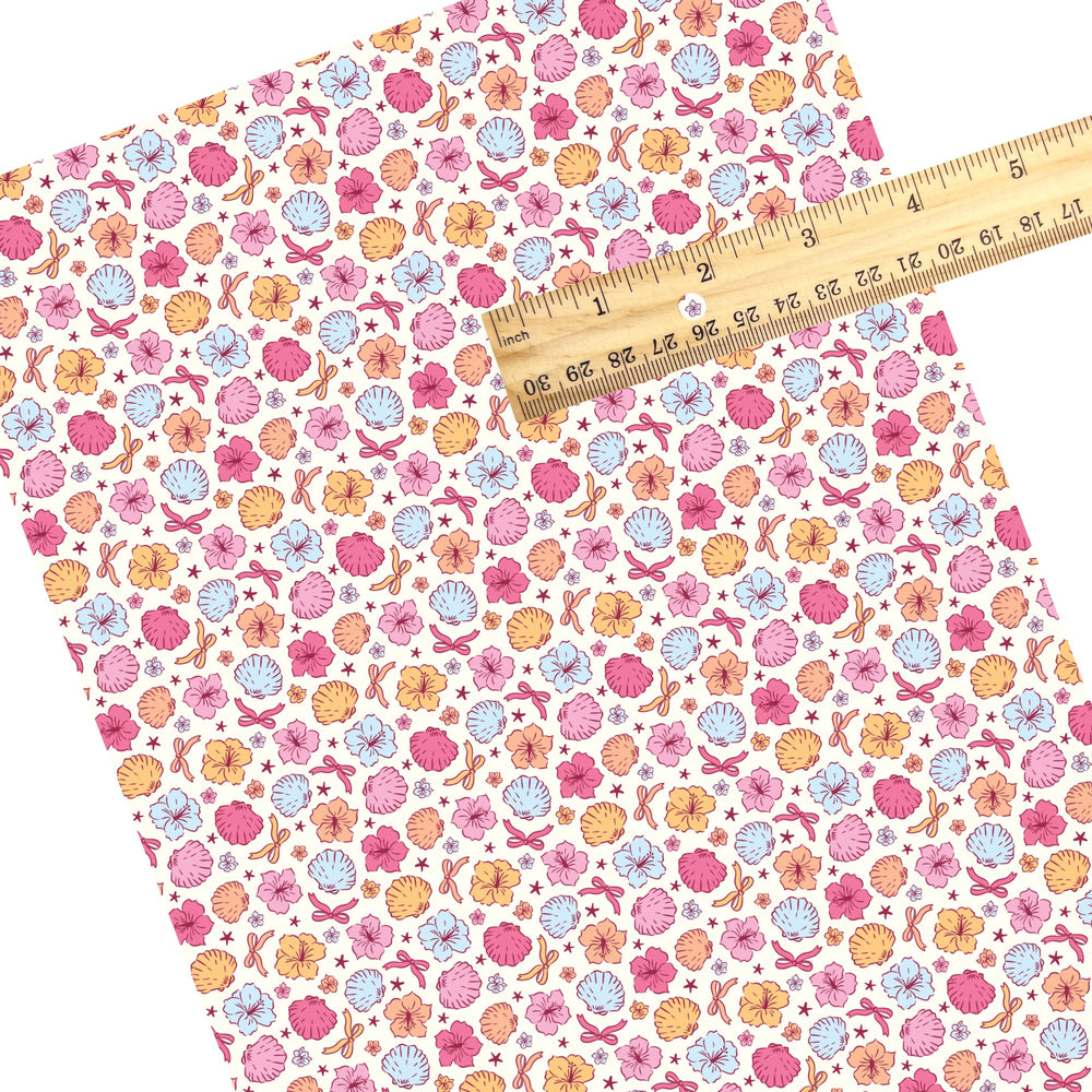 These tropical themed faux leather sheets contain the following design elements: tropical flowers and shells. Our CPSIA compliant faux leather sheets or rolls can be used for all types of crafting projects.