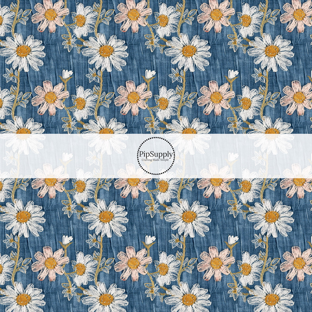 These spring fabric by the yard features embroidered daisies on denim pattern. This fun pattern fabric can be used for all your sewing and crafting needs!