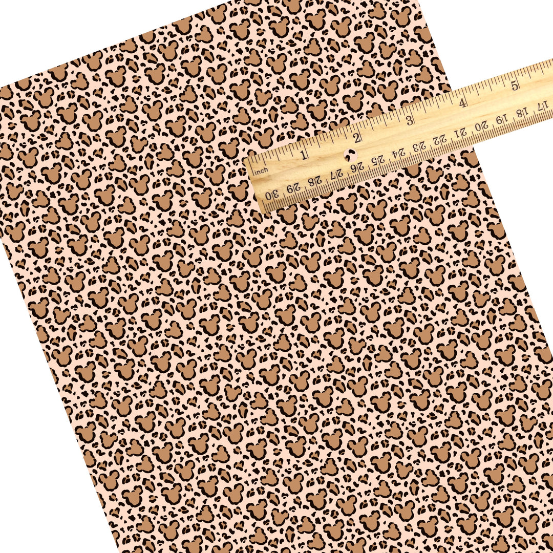 These mouse themed faux leather sheets contain the following design elements: brown leopard mouse pattern. Our CPSIA compliant faux leather sheets or rolls can be used for all types of crafting projects.