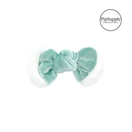 small winter aqua velvet knotted bow with white fur trim