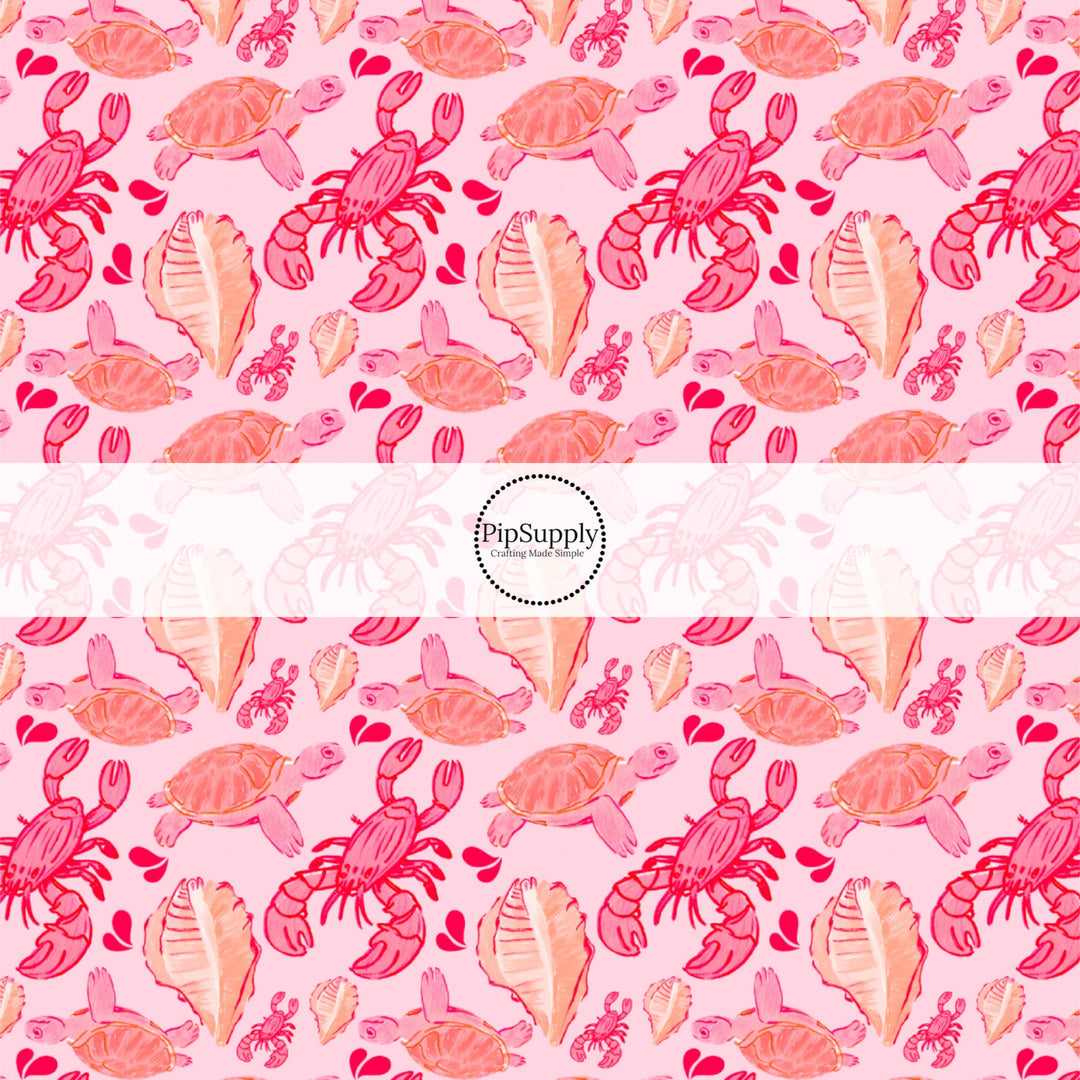 These ocean themed fabric by the yard features lobsters and turtles on pink. This fun pattern fabric can be used for all your sewing and crafting needs!