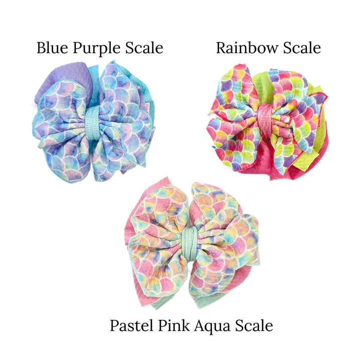 These mermaid patterns layered bows can be quickly cut and assembled for a trendy summer bows. They're ideal for easy at-home styling, individual use, or even resale. Get creative and add a splash of color to your look with these low-maintenance bows.