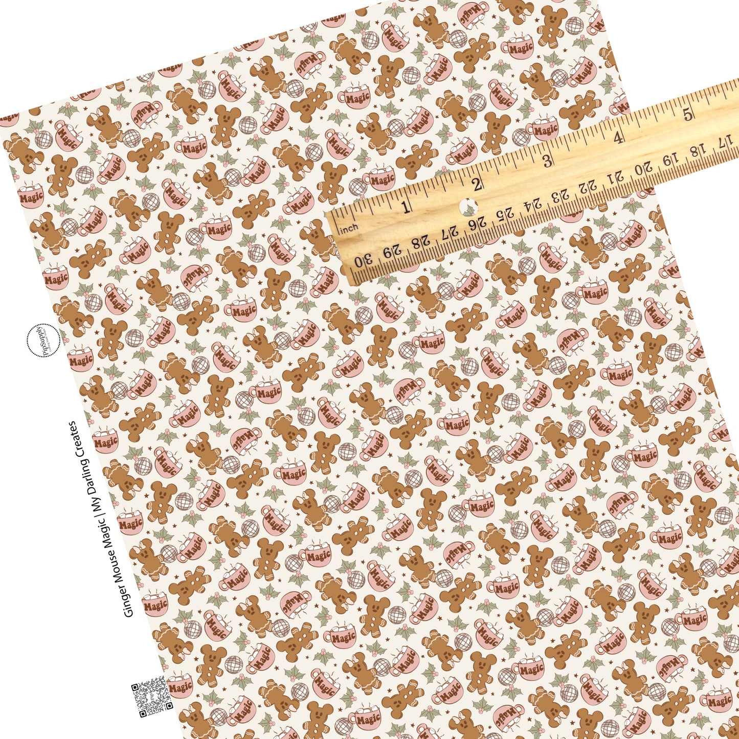 Disco gingerbread mouse with cup of cocoa on cream faux leather sheets