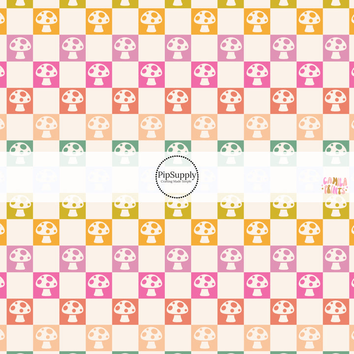 This spring themed fabric by the yard features colorful mushrooms on multi colored checkers. This fun pattern fabric can be used for all your sewing and crafting needs!