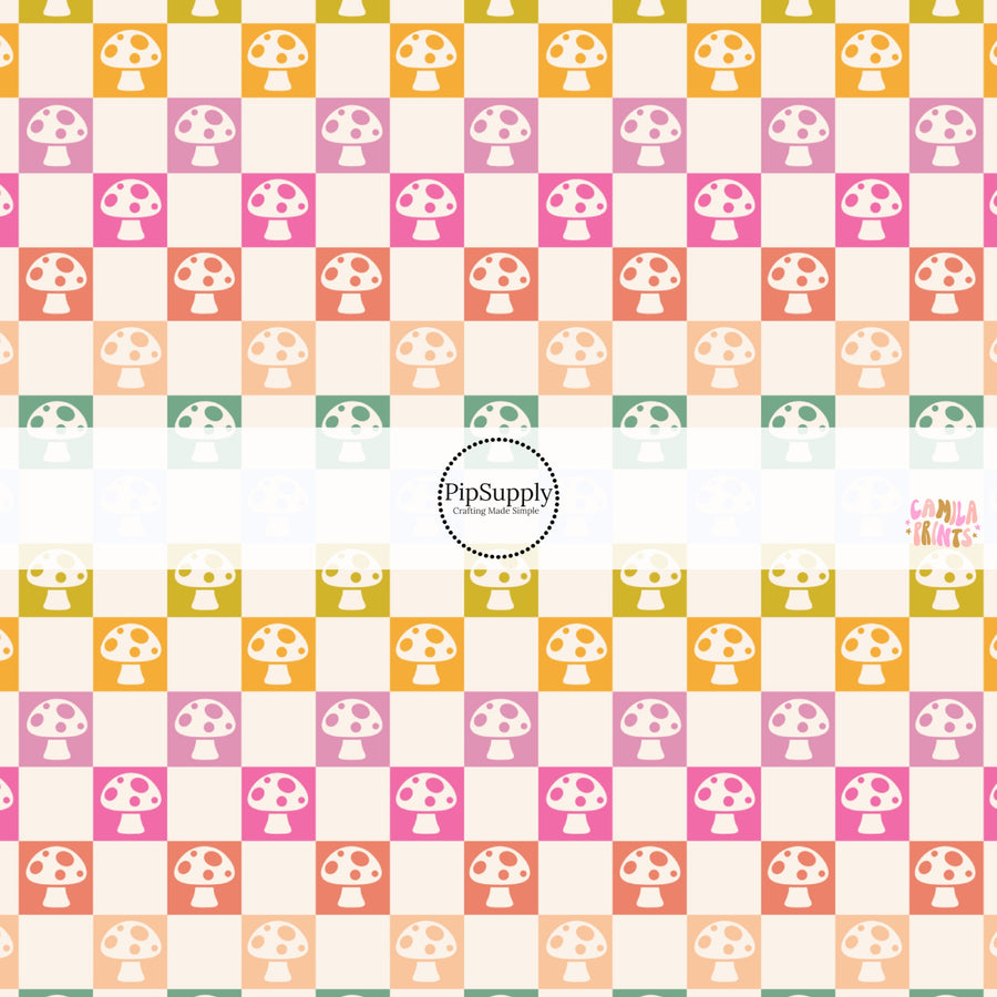 This spring themed fabric by the yard features colorful mushrooms on multi colored checkers. This fun pattern fabric can be used for all your sewing and crafting needs!