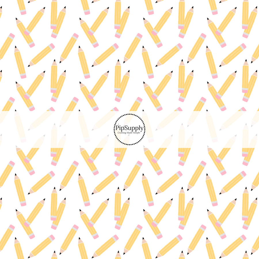 These school themed fabric by the yard features pastel pencil pattern. This fun pattern fabric can be used for all your sewing and crafting needs!