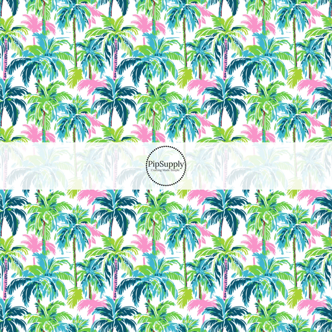These tropical themed fabric by the yard features tropical palm trees. This fun pattern fabric can be used for all your sewing and crafting needs!