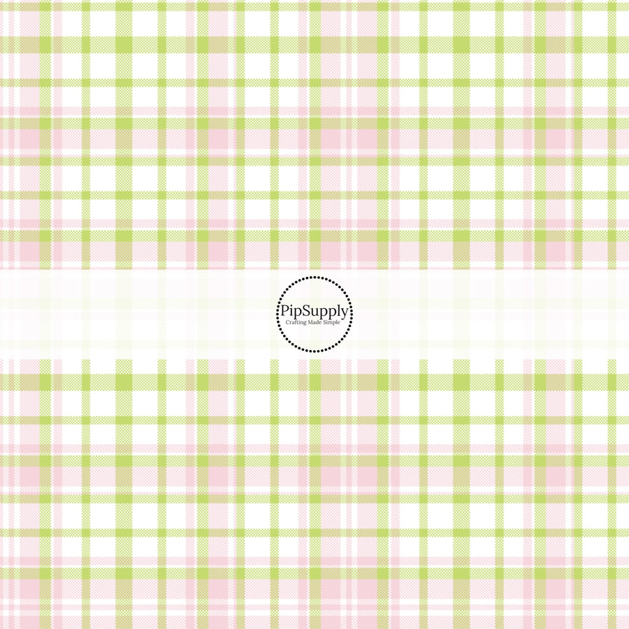 This spring themed fabric by the yard features pink and green plaid pattern. This fun pattern fabric can be used for all your sewing and crafting needs!