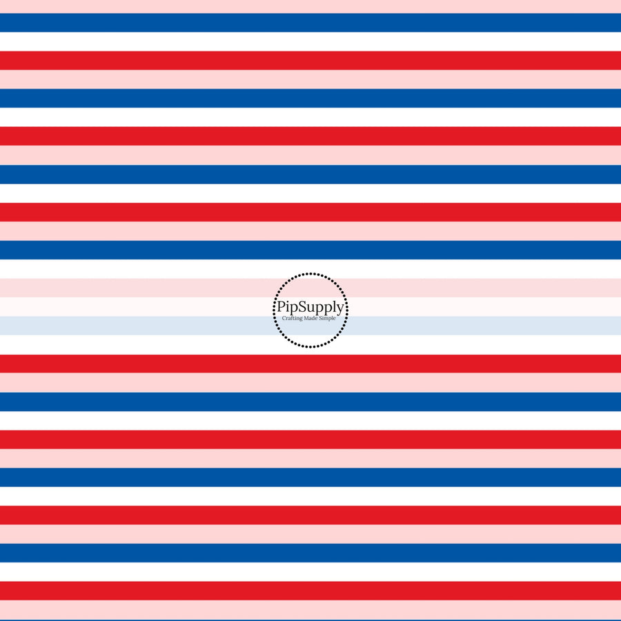 These patriotic fabric by the yard features blue, pink, and red stripes. This fun pattern fabric can be used for all your sewing and crafting needs!