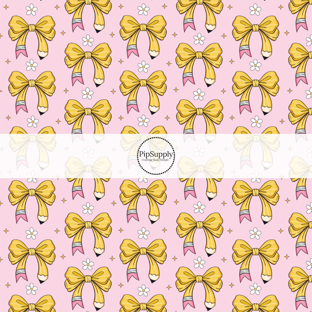These school themed fabric by the yard features pink pencil bows pattern. This fun pattern fabric can be used for all your sewing and crafting needs!