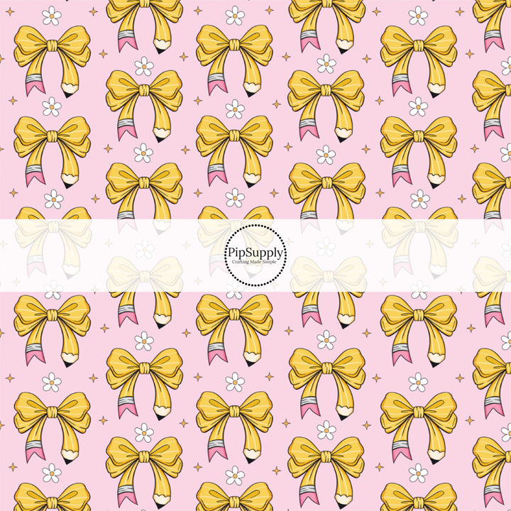 These school themed fabric by the yard features pink pencil bows pattern. This fun pattern fabric can be used for all your sewing and crafting needs!