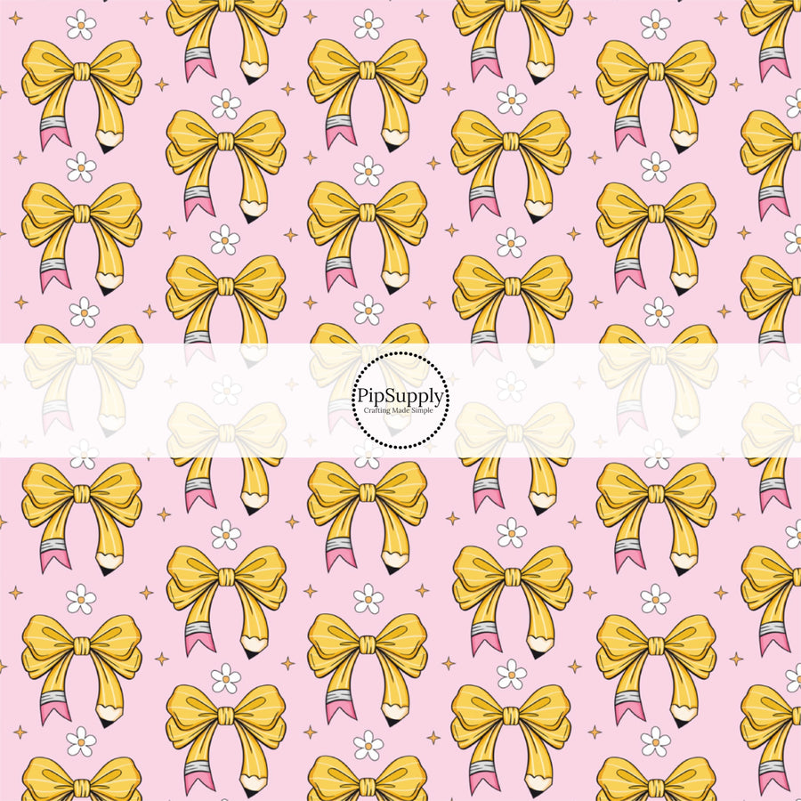 These school themed fabric by the yard features pink pencil bows pattern. This fun pattern fabric can be used for all your sewing and crafting needs!