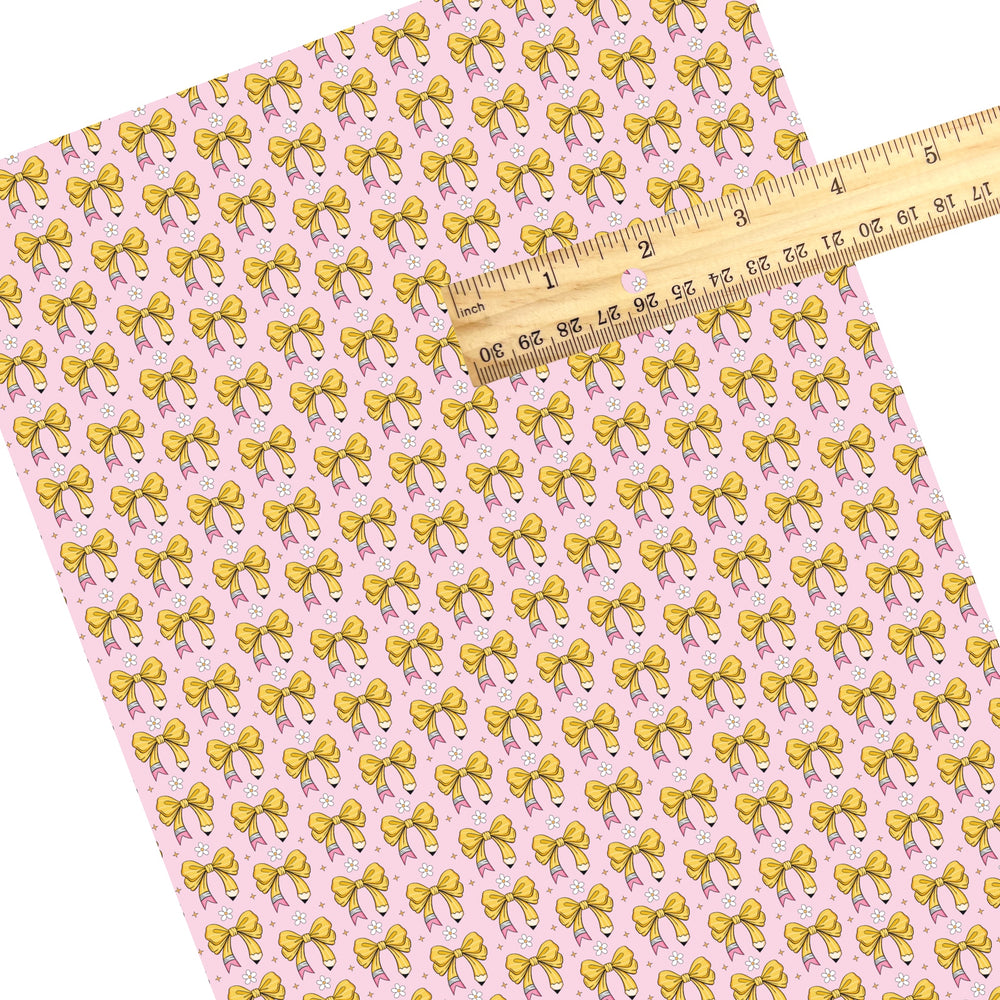 These school themed faux leather sheets contain the following design elements: pink pencil bows pattern. Our CPSIA compliant faux leather sheets or rolls can be used for all types of crafting projects.