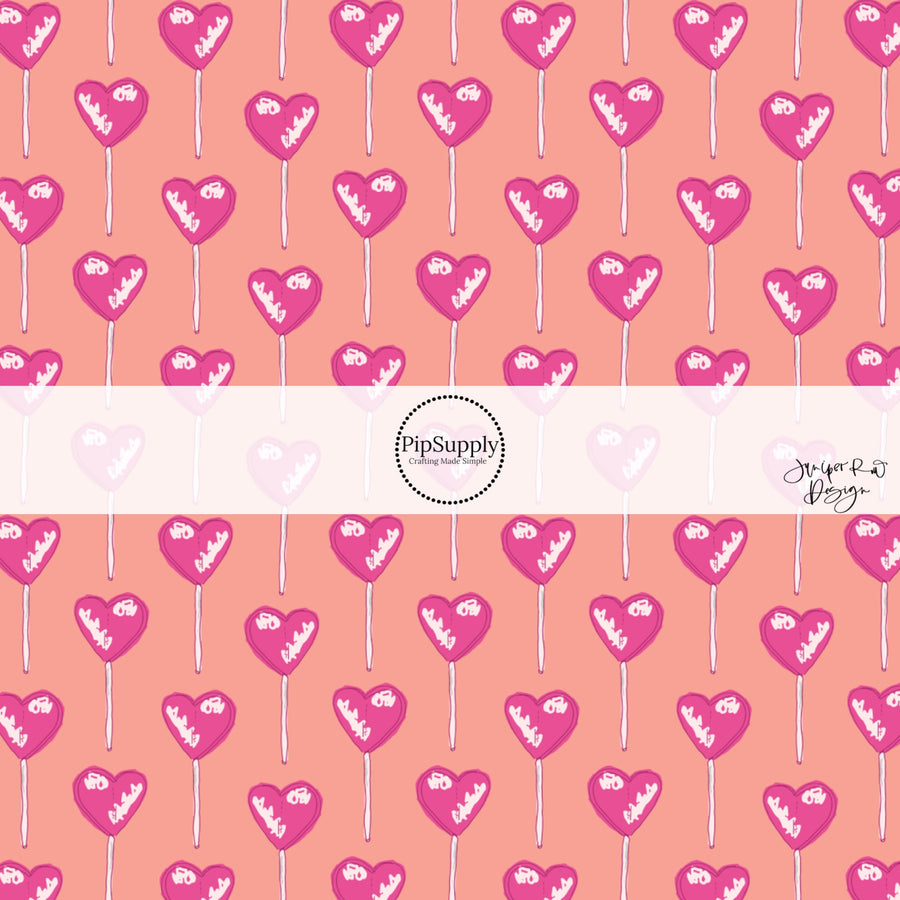 This holiday fabric by the yard features heart shaped lollipops. This festive pattern fabric can be used for all your sewing and crafting needs!