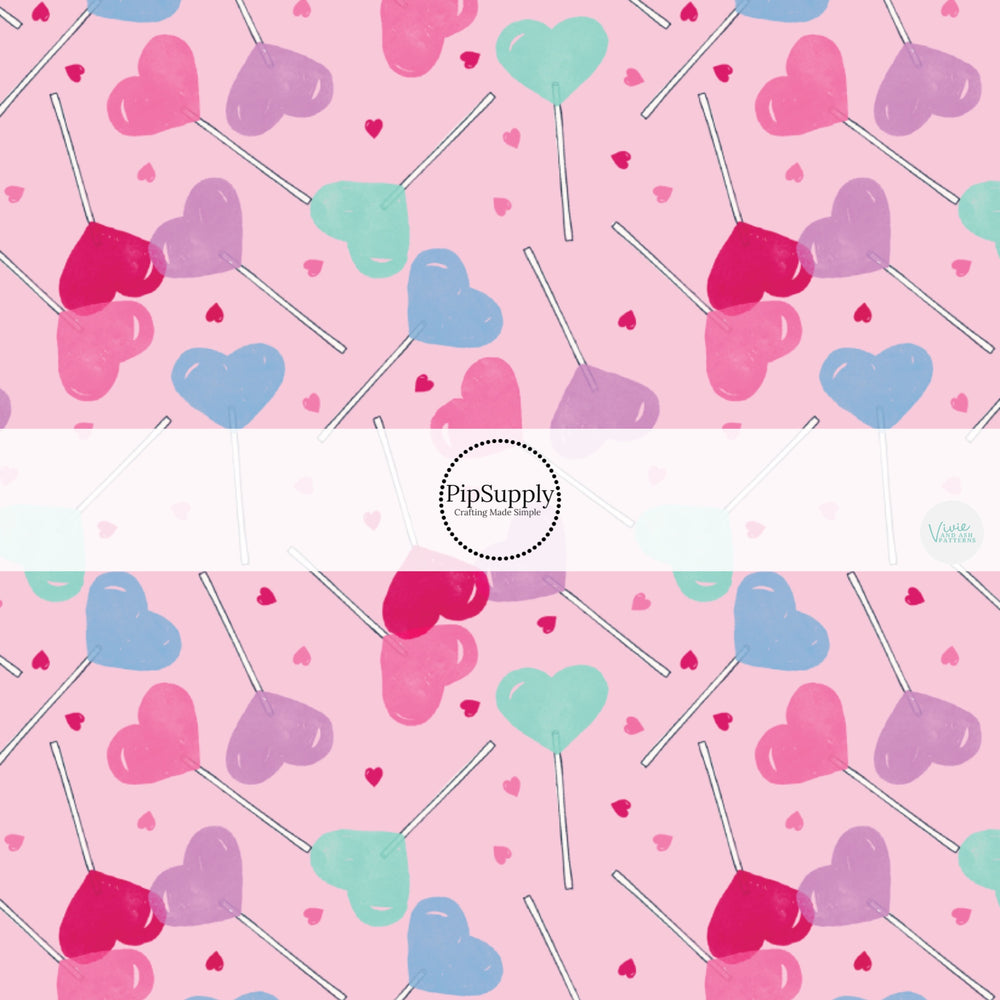 These Valentine's Day pattern no sew bow strips can be easily tied and attached to a clip for a finished hair bow. These Valentine's Day bow strips are great for personal use or to sell. The bow strips feature pastel colored lollipop candy on pink.