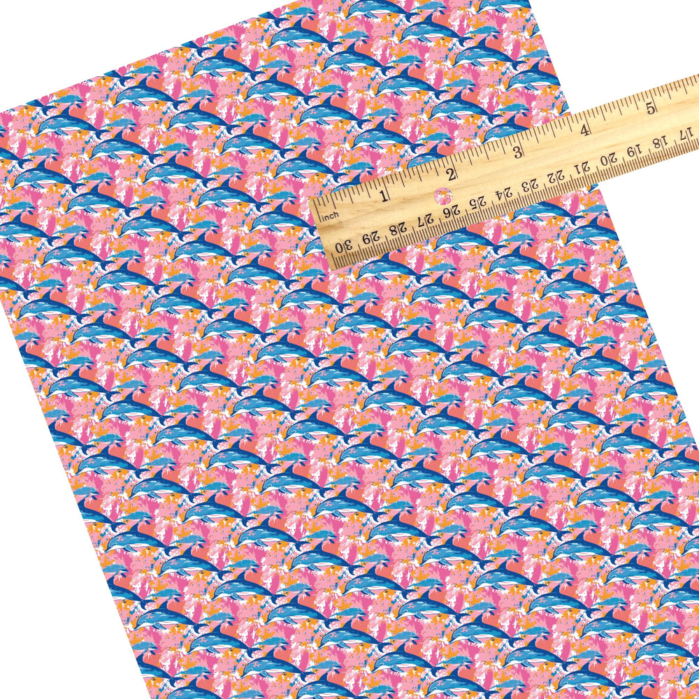 These beach themed faux leather sheets contain the following design elements: dolphins on pink. Our CPSIA compliant faux leather sheets or rolls can be used for all types of crafting projects.