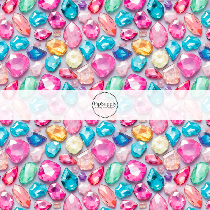 These gemstone themed fabric by the yard features colorful and bright realistic gemstones. This fun pattern fabric can be used for all your sewing and crafting needs!