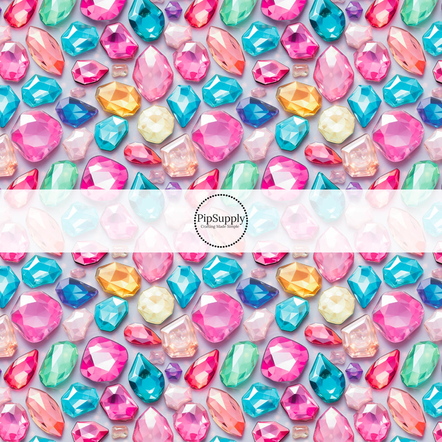 These gemstone themed fabric by the yard features colorful and bright realistic gemstones. This fun pattern fabric can be used for all your sewing and crafting needs!