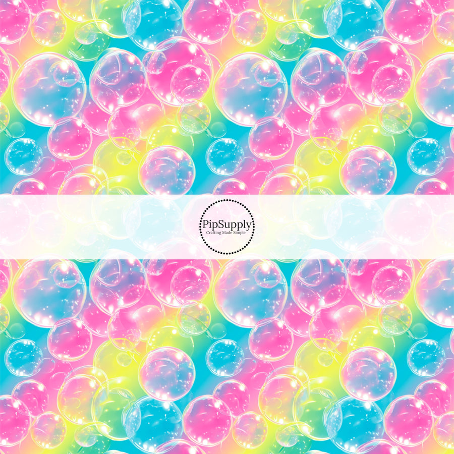 These bubble themed fabric by the yard features realistic rainbow bubbles. This fun pattern fabric can be used for all your sewing and crafting needs!